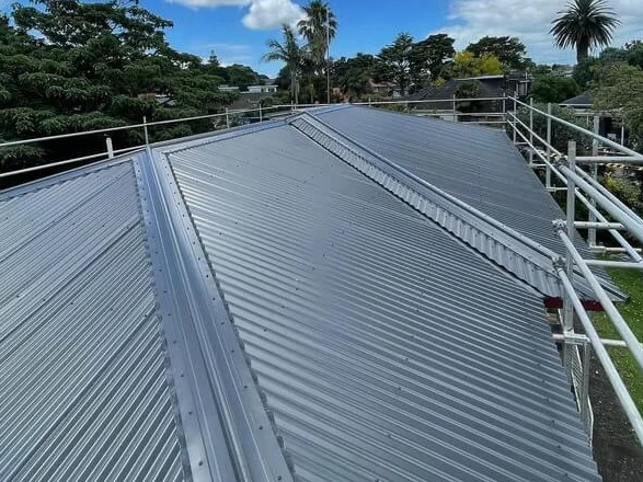 Corrugated metal roof installation in progress on an Australian home