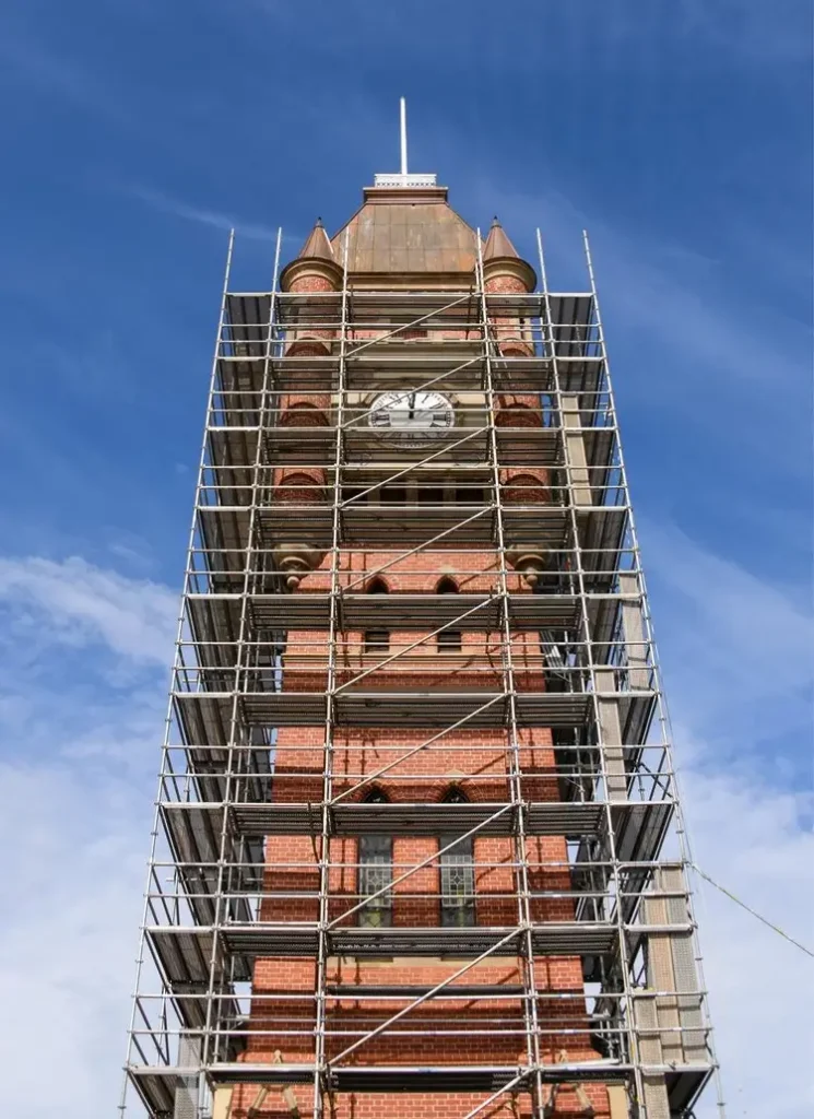 Tasmania Restoration conservation project featuring a scaffolded heritage clock tower under restoration